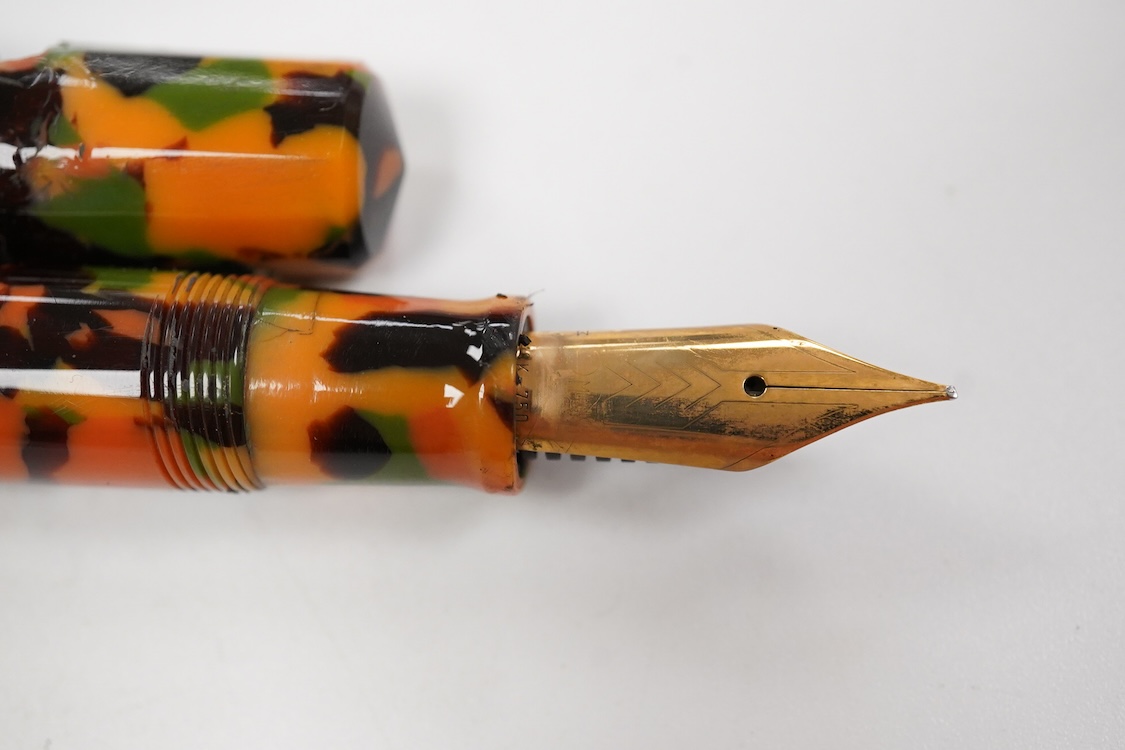 An Omas orange, green and black marble Paragon fountain pen (shrinkage to cap)